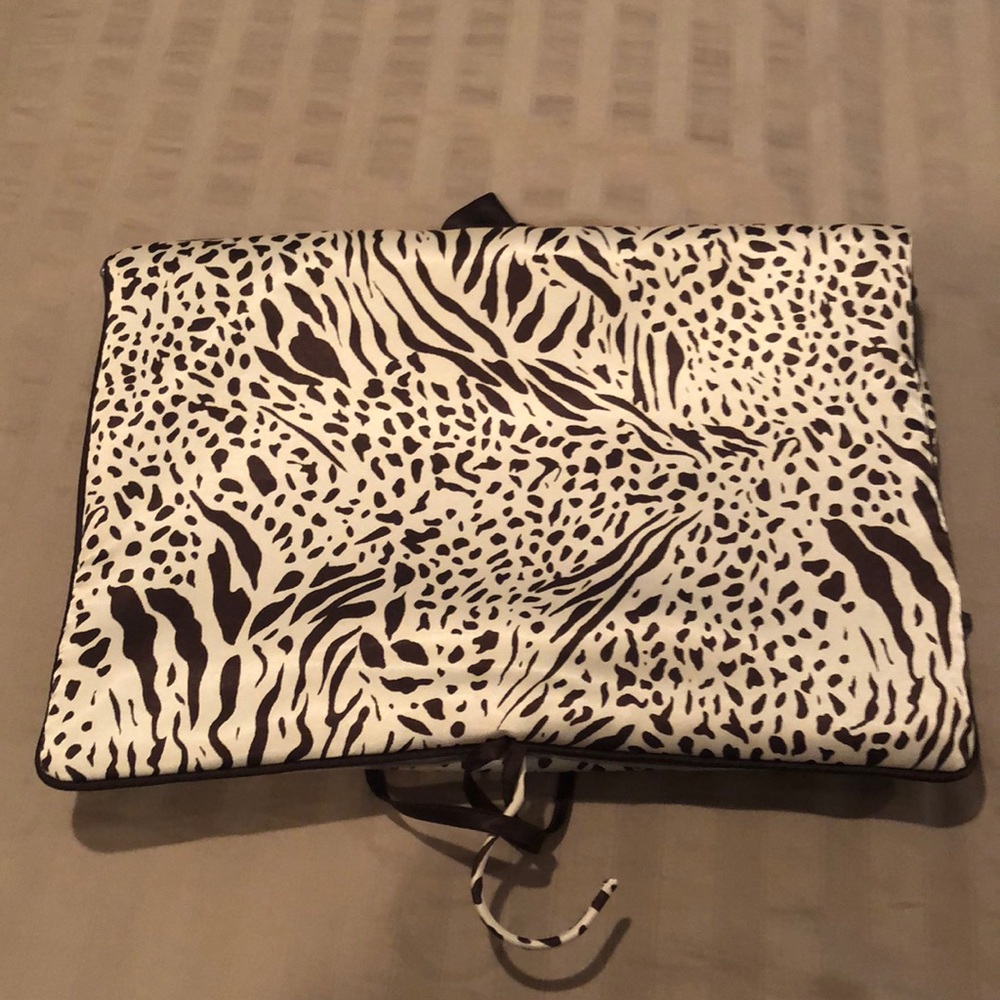 Gold and brown animal print lingerie travel bag